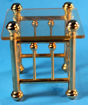 Glass and brass occasional table