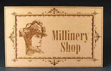 Millinery shop sign