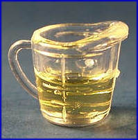 Measuring cup of oil