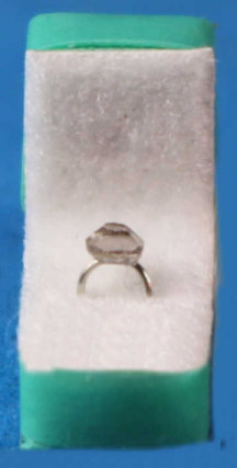 Faux diamond ring in presentation box