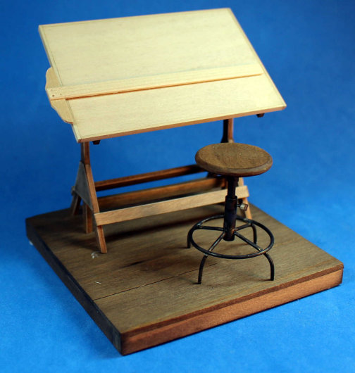 Drafting table with swivel stool