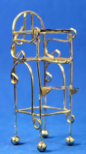 Brass high chair - a couple of scratches on the tray area (image for) Brass high chair - a couple of scratches on the tray area