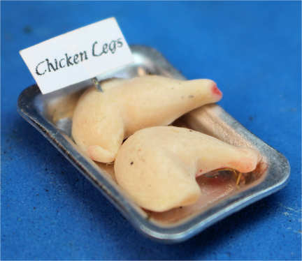 Chicken legs in tray
