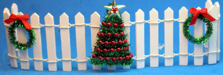 Christmas decorated picket fence