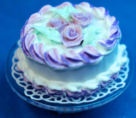 Cake - lavendar roses on glass pedestal