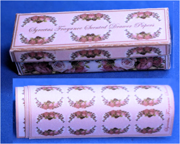 Box of drawer liner papers - pink background