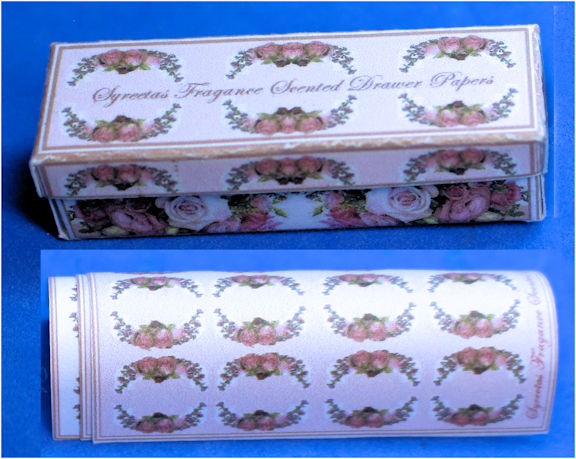 Box of drawer liner papers - white background