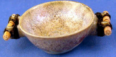 Bowl with bamboo handles