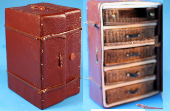 Leather trunk with wicker drawers