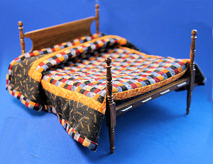 (image for) Rope bed with quilt