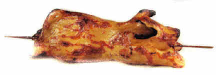 (image for) Roasting pig on spit