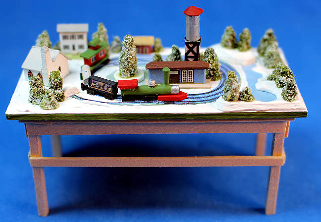 Model train set -snow covered town 1/2"-1" scale