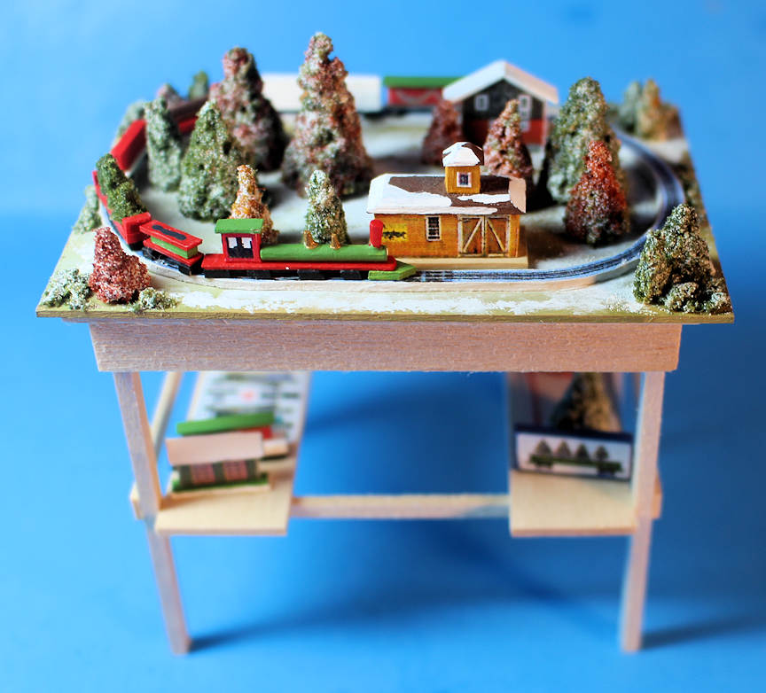 Model train set Christmas trees