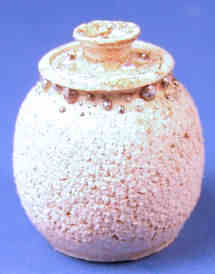 Lidded jar with silver
