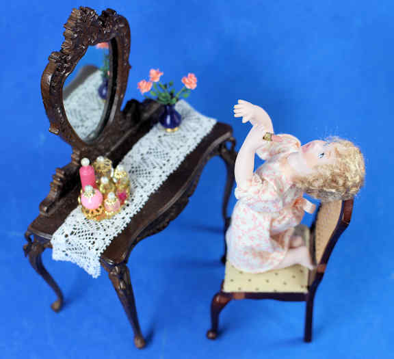 Girl putting on lipstick - Mom's vanity (image for) Girl putting on lipstick - Mom's vanity