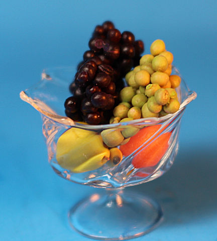 Fruit filled footed bowl