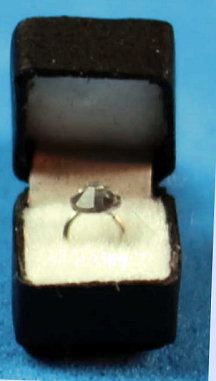 Faux diamond ring in presentation box