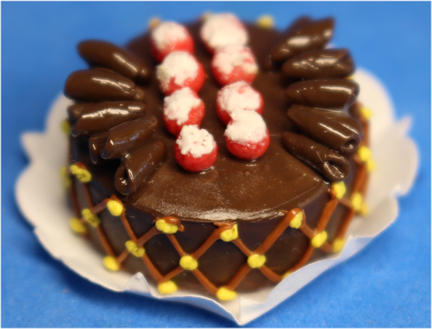 Chocolate cake with frosted cherries