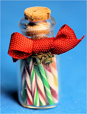 Jar of candy sticks - Click Image to Close