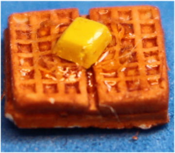 Waffles with butter and syrup