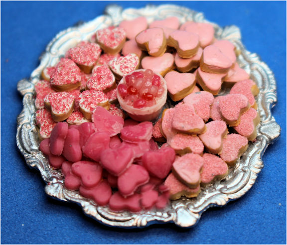 Heart shaped cookies on platter - jelly beans in the center