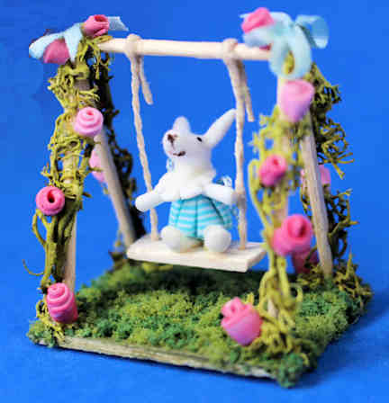 Rabbit on a swing - white rabbit - child's toy (image for) Rabbit on a swing - white rabbit - child's toy