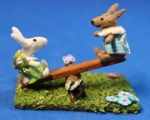 Bunnies on see saw - child's toy (image for) Bunnies on see saw - child's toy