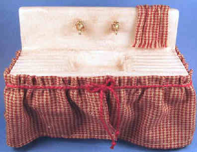 (image for) Sink - grundgy red skirted