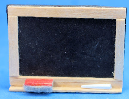 (image for) Blackboard with chalk and red eraser