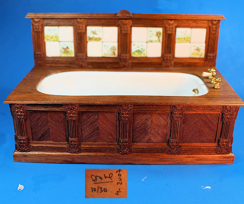 Bathroom tub with hand painted ceramic tiles