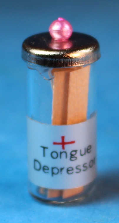 Tongue depressors in jar
