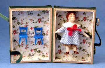 Doll for a doll in a suitcase