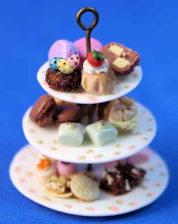 (image for) Tiered dish of petit fours & macaroons by Linda Cummings