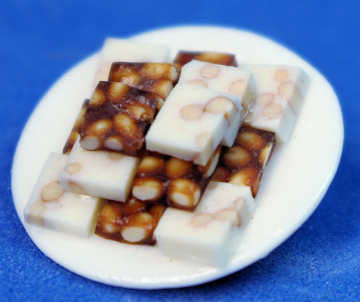 Plate of white and dark chocolate with nuts (image for) Plate of white and dark chocolate with nuts